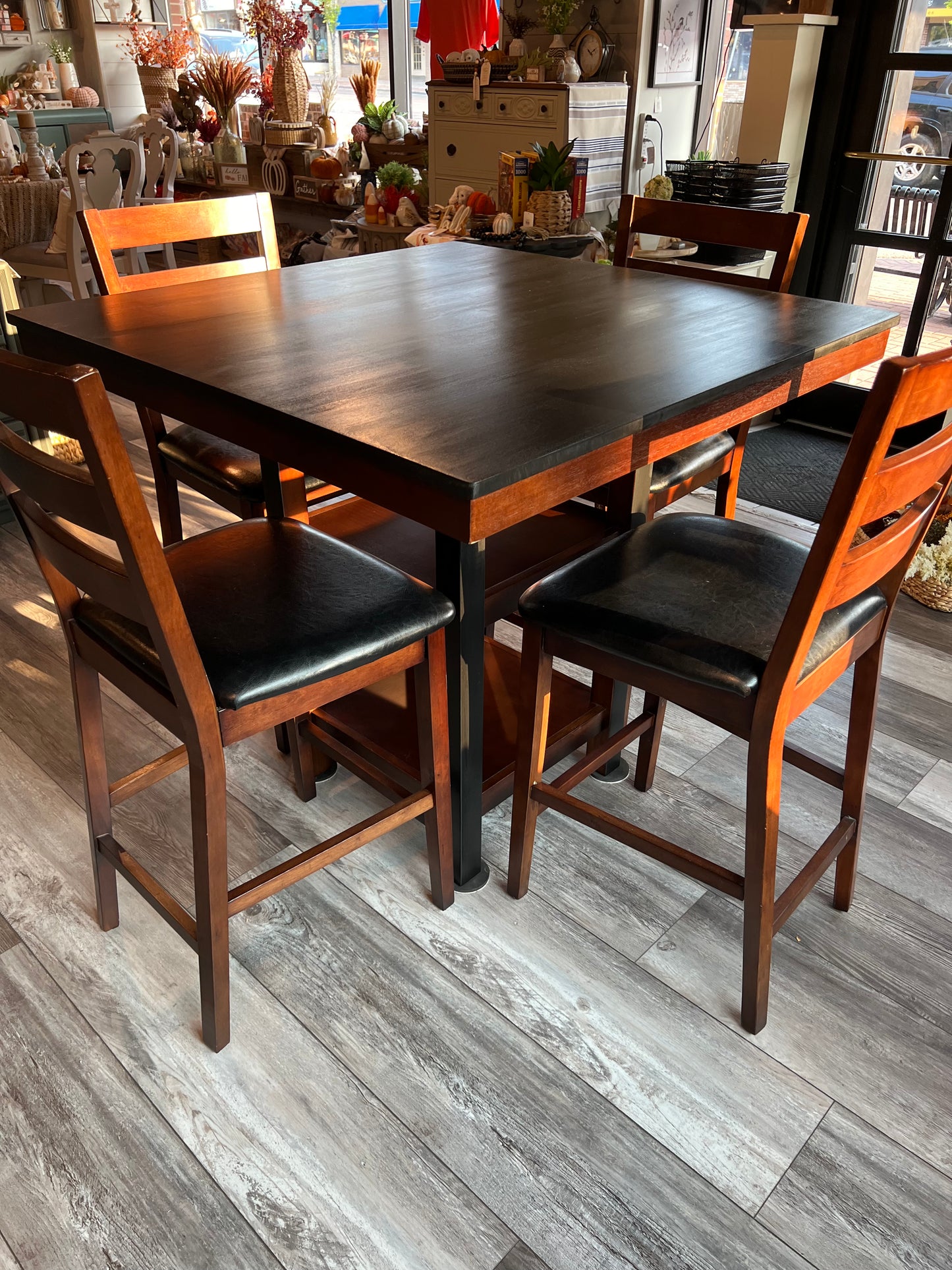 Black and Brown High Top Table with Four Chairs