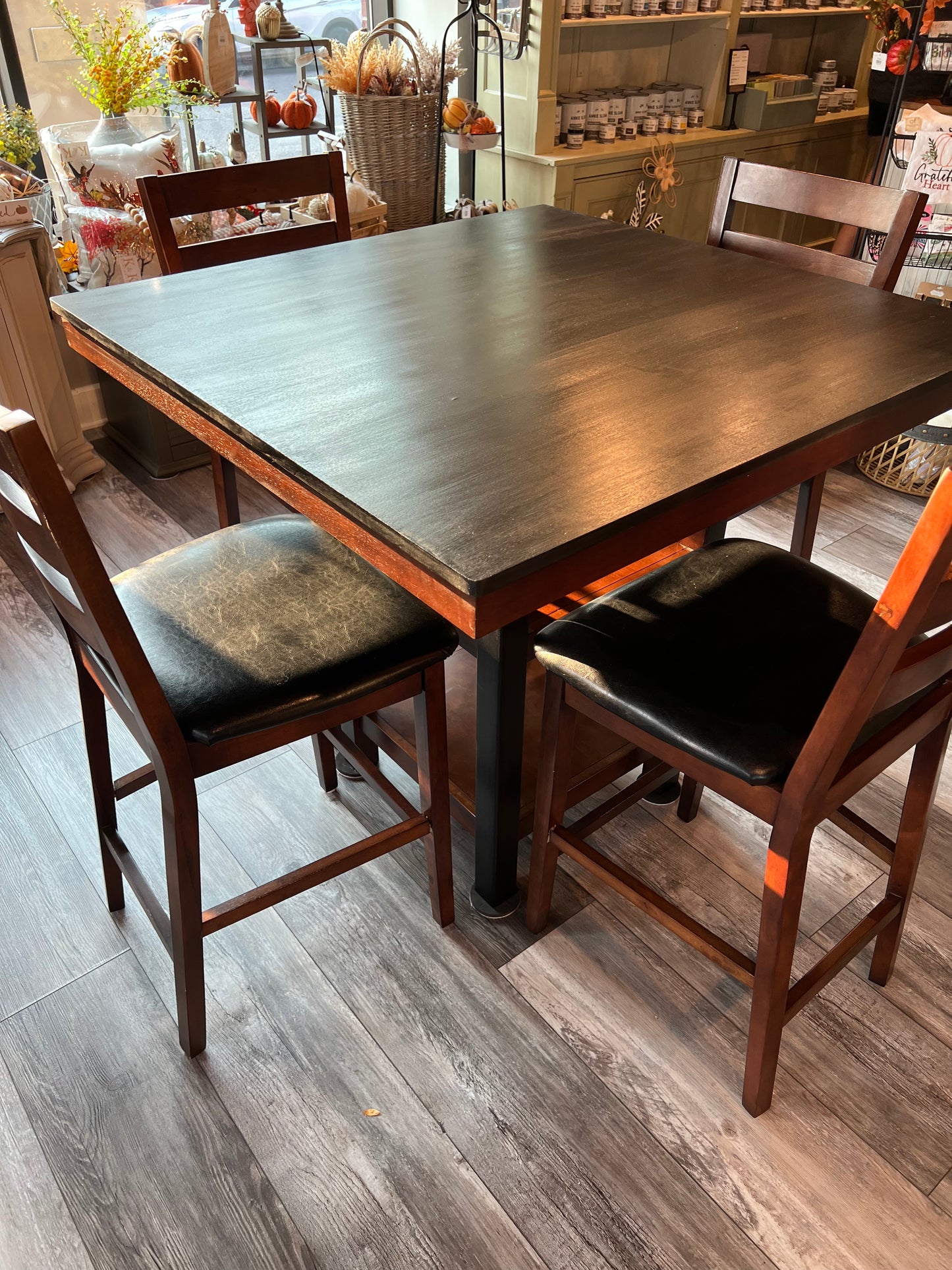 Black and Brown High Top Table with Four Chairs