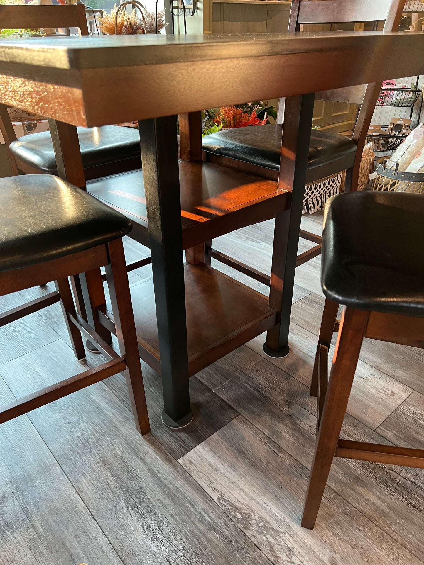 Black and Brown High Top Table with Four Chairs